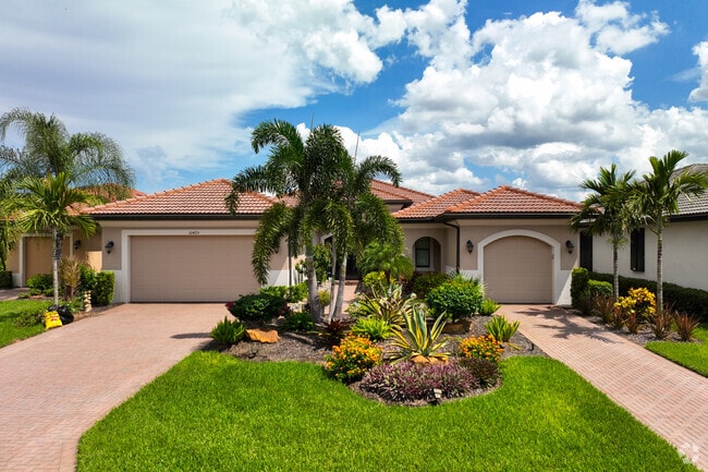 Colorful gardens elevate homes in Pelican Preserve.