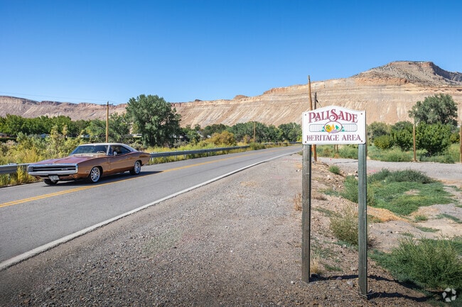 Experience rural living with easy access to shopping and dining in the Palisade Area.