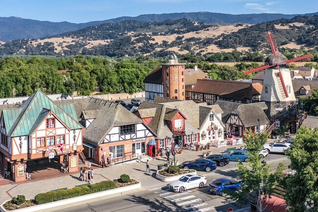 Windmills and Danish-themed buildings line Alisal Road, the main attraction in Solvang.