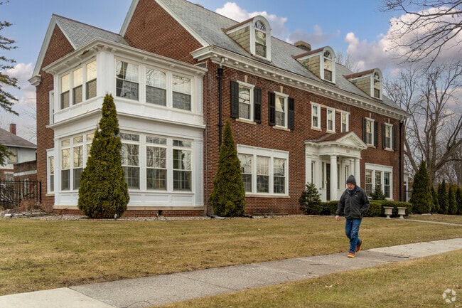 A wonderfully restored brick colonial home is on a corner lot in Heritage Square.