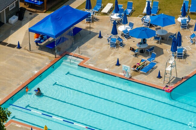 Residents of Lindmoor Woods–Valley Brook Estates enjoy access to local swim and tennis clubs with sparkling pools and recreational spaces.