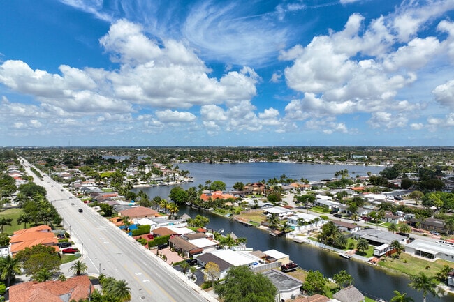 Some residents in Palm Springs North enjoy waterfront views by small lakes.
