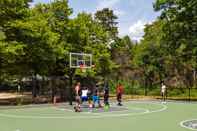 Play a pick up game with friends at the basketball courts in New Brooklyn Park.