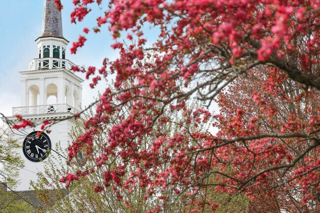 The clock tower overlooks the beauty of the neighborhood of Billerica.