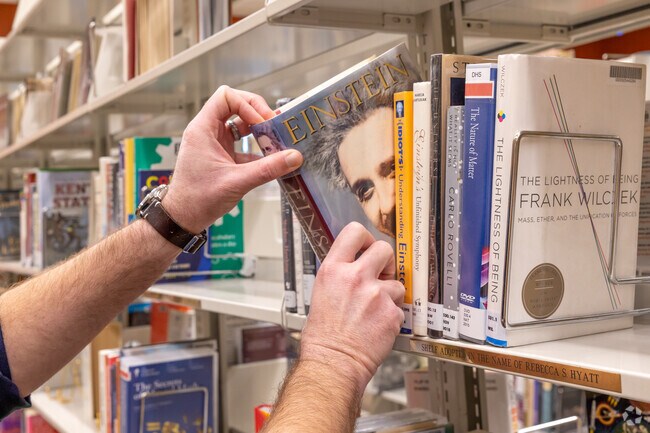 Families discover a world of books at Cathedral Country Club library, CA.
