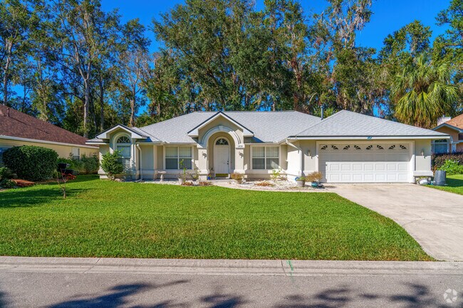Freshly cut grass and a well-maintained exterior highlight this Broadmoor home.