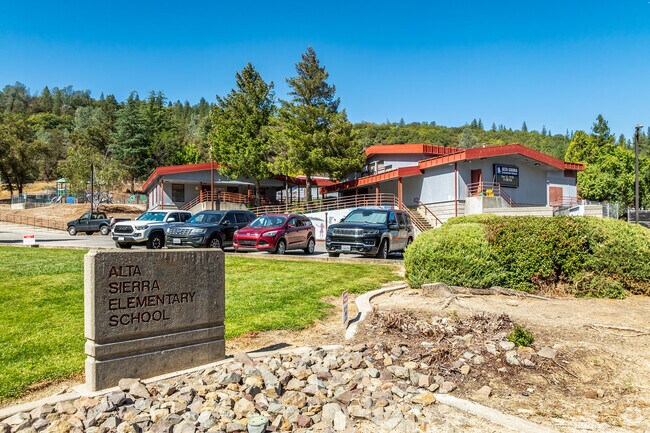The entrance to Alta Sierra Elementary School has an engraved stone signage.
