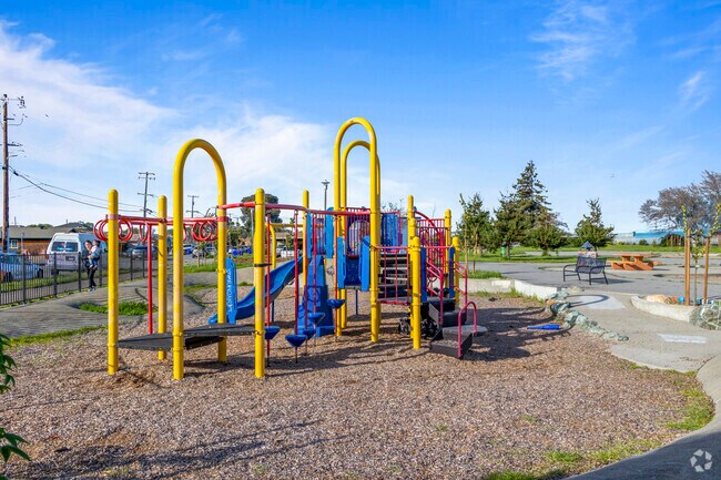 Adventure calls Children at Lucas Park jungle gym in Iron Triangle.