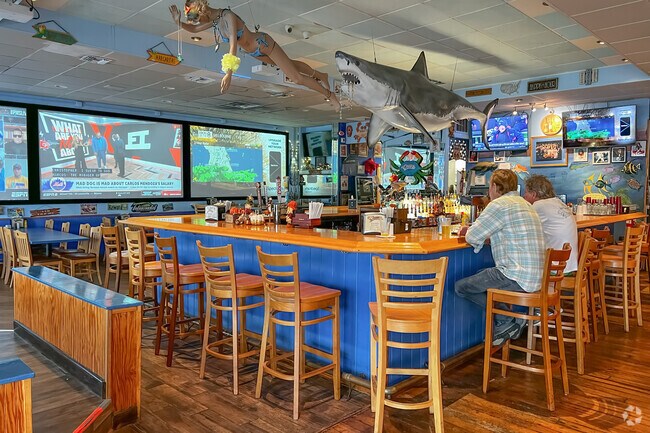 Cheers on the Beach Pub and Grill is where locals congregates for lively moments.
