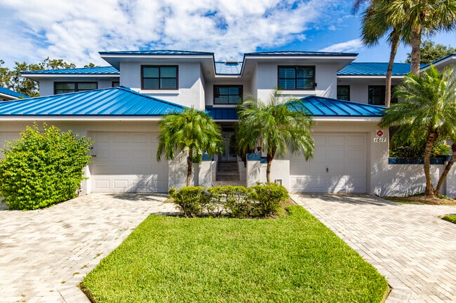 Watermark, in Mariners Pass, offers condos with tropical landscaping and nice entrances.