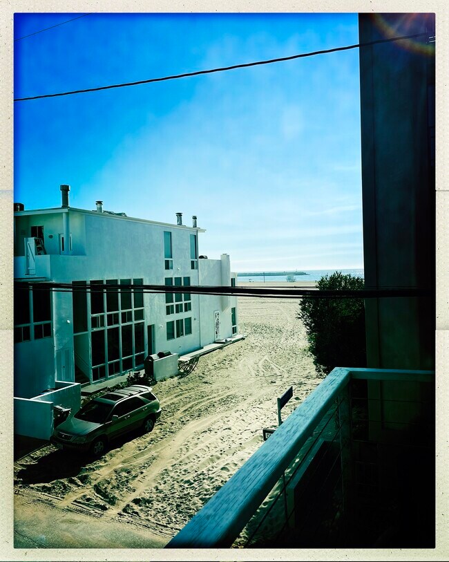 Proximity to beach, photo from front balcony, NOT from rental unit, but from adjacent balcony