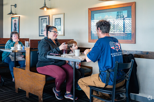 A young Hillcrest family enjoys their lunch at the nearby Spencer's Cafe.