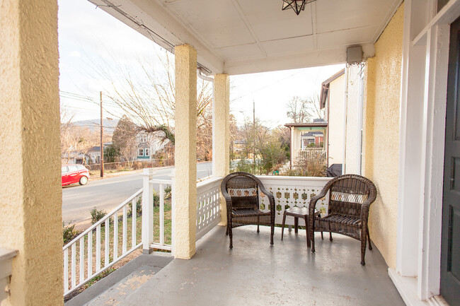 People watch on front porch