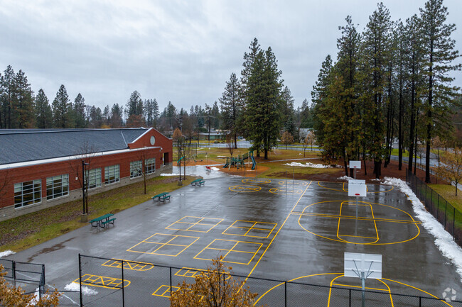 Jefferson Elementary has several playgrounds in basketball courts.