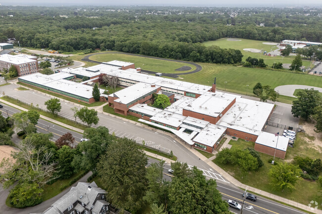 Situated in a learning community campus the Dartmouth Middle School occupies a prominent corner.