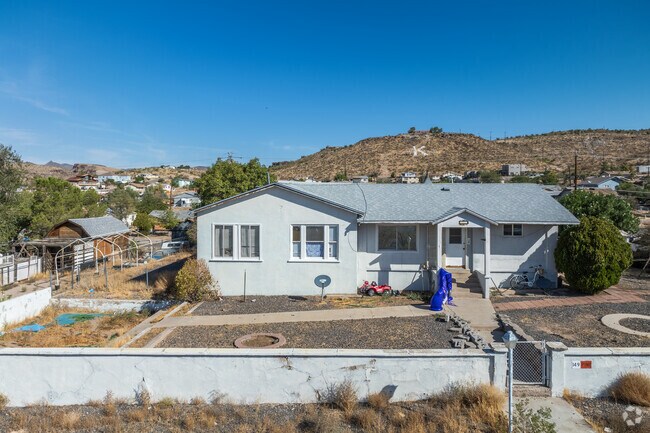 Homes in Kingman typically sit on large lots with desert landscaping.
