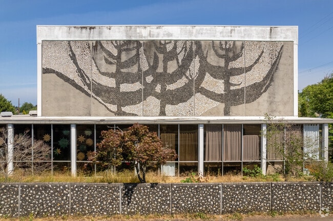 Portland Village School's rock abstract mural and planters bring dimension to the campus.