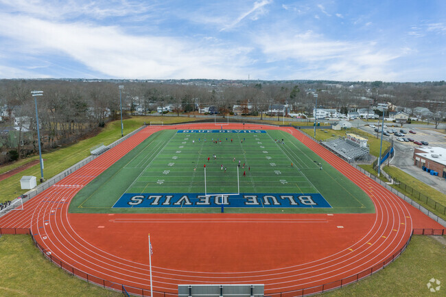 Cheer on the Blue Devils at every home game at the Randolph High School in Randolph, MA.
