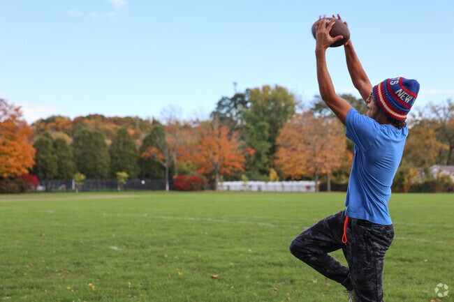 Residence enjoy tossing around the football at Sarah Jane Sherman Park in Willmansett.
