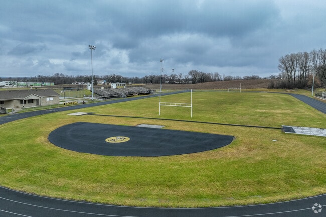 Harvard High School has a large football field with track.