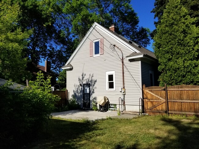 Private Fenced-in Backyard with concrete patio