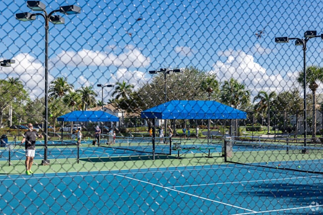 Delasol residents can play tennis and pickleball on the club courts.