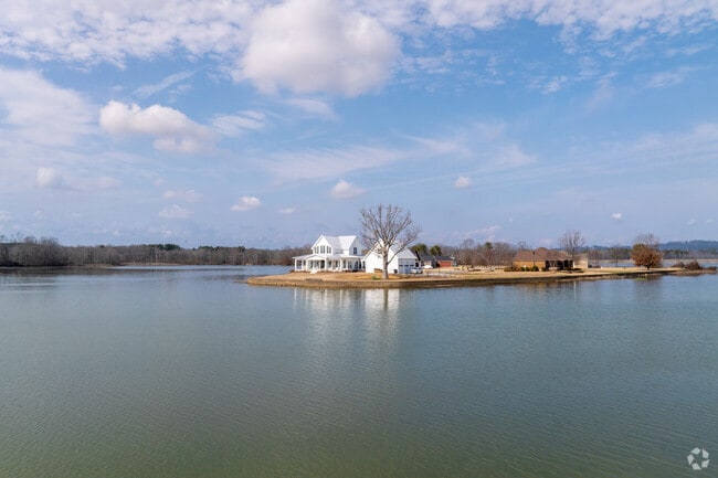 Discover the allure of lakeside living in Gadsden City, where charming homes await you by the water's edge.