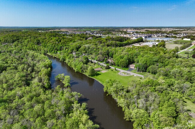 The Crow River meanders along the southern border of St. Michael.
