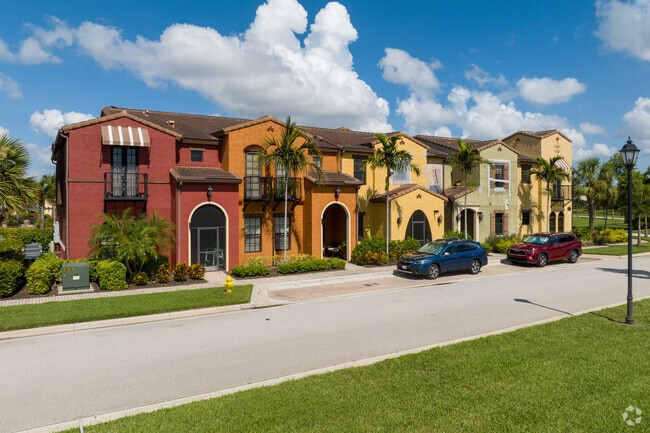 This row of townhomes in Paseo is painted with bright earth tone colors.