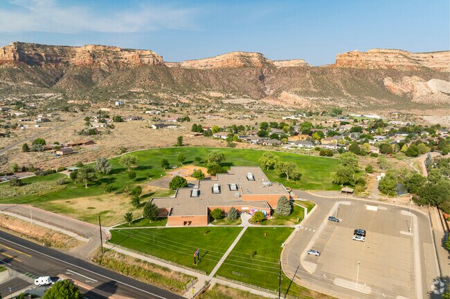 Against the backdrop of the Colorado Monument, Wingate Elementary School is beautiful.