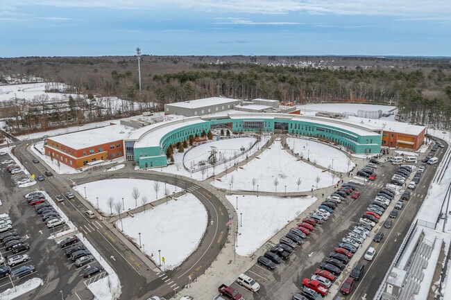 An aerial view of the large Holbrook Junior/Senior High School campus in Holbrook, MA.