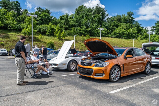 Mixing classics with late model cars at the Washington Chevy 1st Annual Car Show.