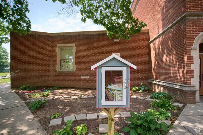 Students can borrow books at the free library at Charles Carroll School No. 46.