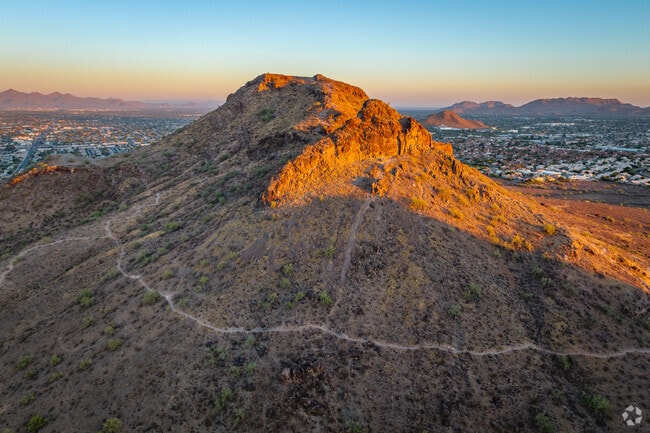 Sunset at Lookout Mountain bathes Moon Valley in golden hues.
