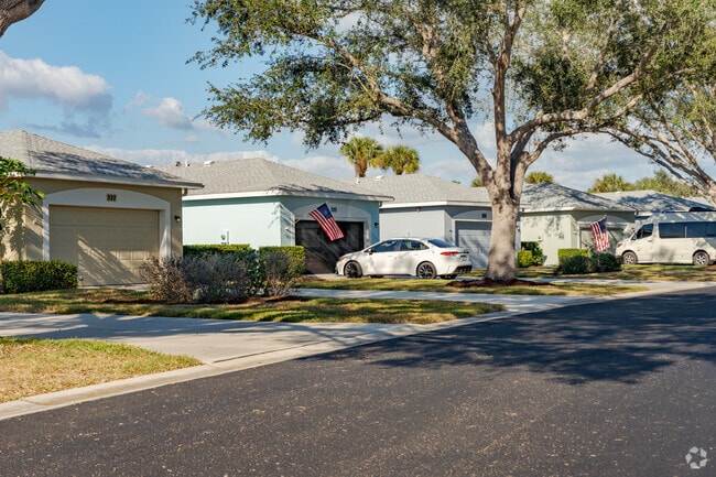 Many of the homes in Venice Farms offer car garages and paved driveways.
