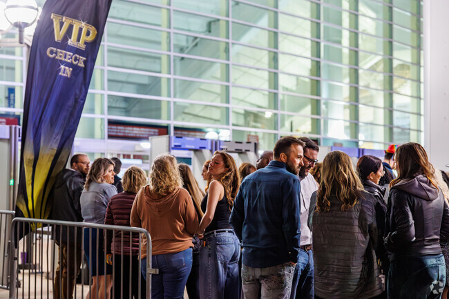 Concert goers queue outside Simmons Bank Arena for a concert just outside East Argenta.
