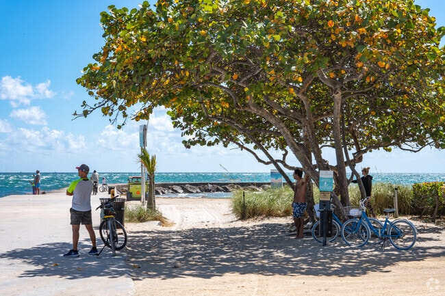 People enjoying a day at the beach at Bal Harbour.