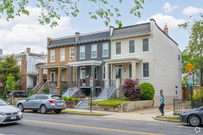 A cluster of semi-detached row homes is a common sight in Hill East.