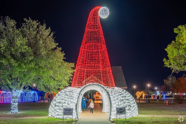 Pecan Valley South families enjoy festive decorations at the Holiday in the Park event.