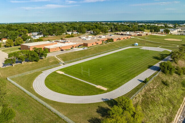 Millard North Middle School's campus boasts a full-size track and football field for athletics.