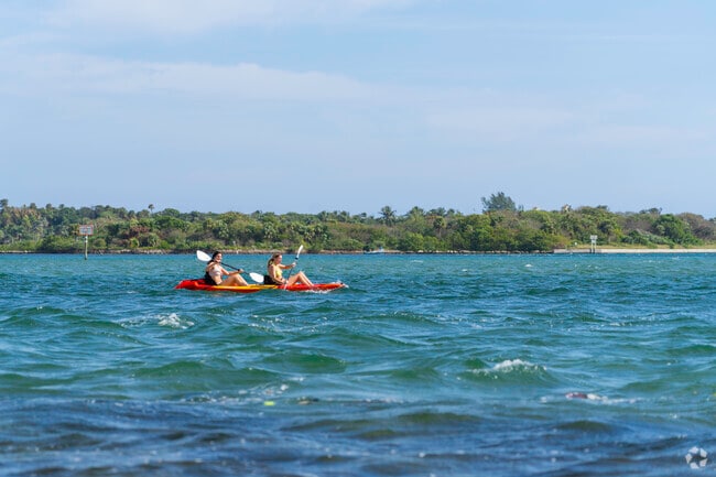 Paddle into tranquility, kayaking in the blue waters of Boynton Bay.