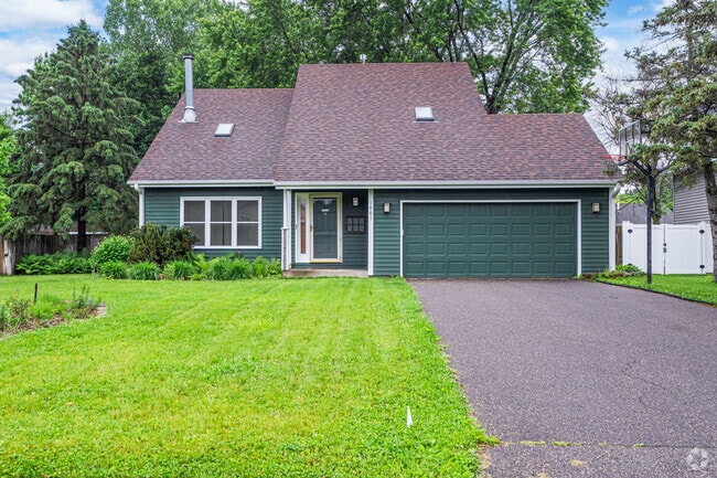A Cape Cod with contemporary details stands out on this quiet Riverview street.