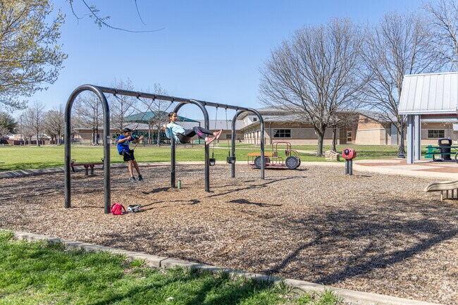 Spring Ridge residents take their children to W.H. Buzz Rasor Park to play.