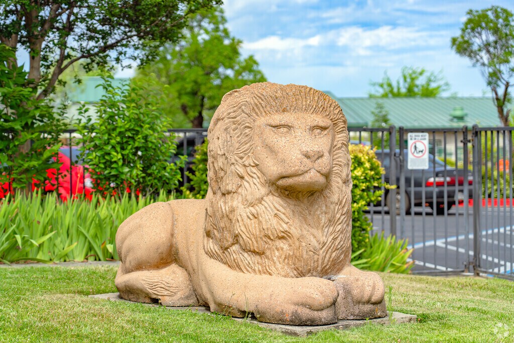 Lion statue welcomes students at the entrance of Columbia Elementary School.