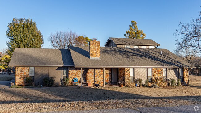 A lovely craftsman home basks in the late afternoon sunlight in Ninnekah.