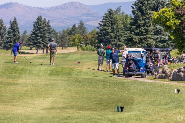 Fox Ridge Golf course is a beautiful course set against the background of hills.