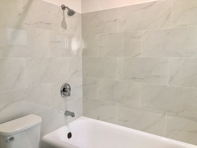 Large deep cast iron tub