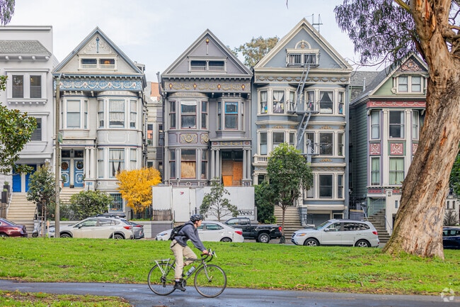 Cycling past North Park's iconic Victorian homes on a scenic ride.