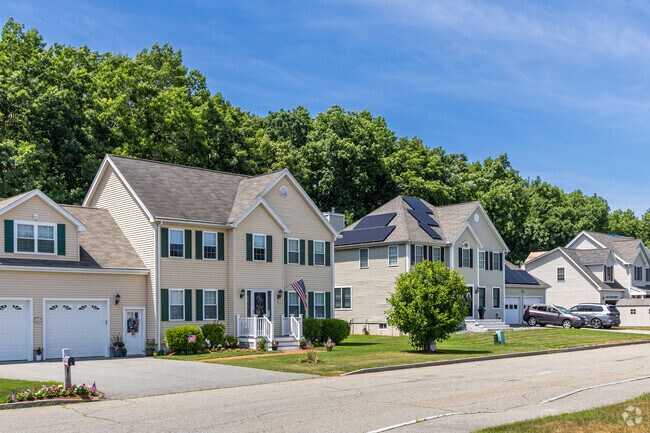 A row of new, traditional homes found  in the Pawtucketville neighborhood.