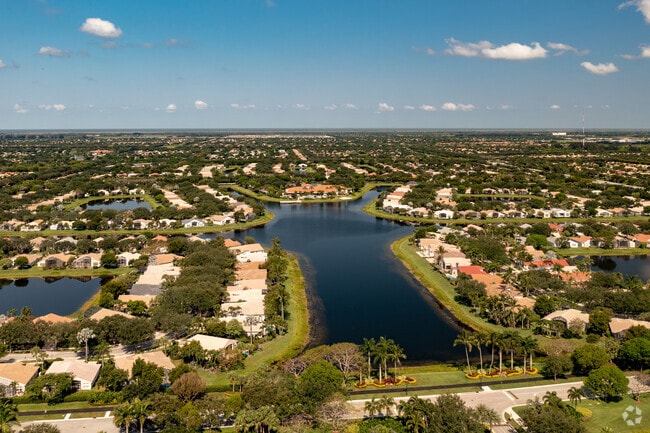Enchanting lake views await at Valencia Isles' scenic paradise.